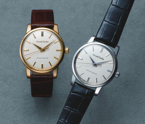 Two Grand Seiko gold and silver anniversary limited edition watches