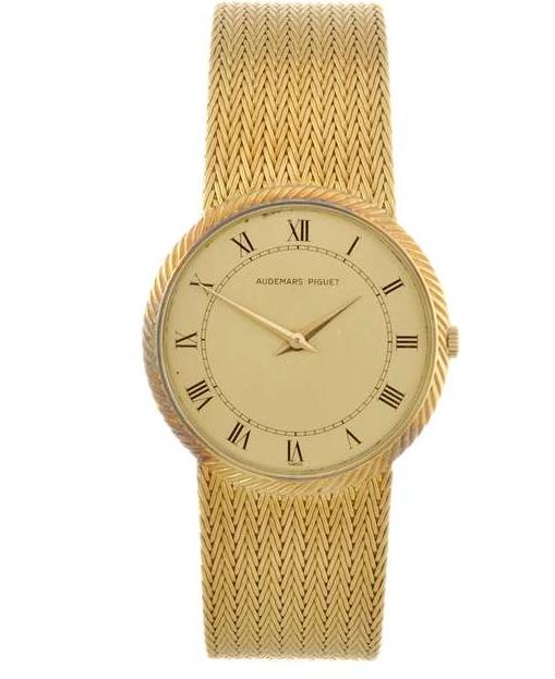 18k gold manual wind gentleman's Audemars Piguet bracelet watch.