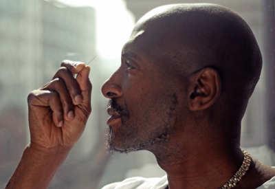 Willard Wigan inspects a pin